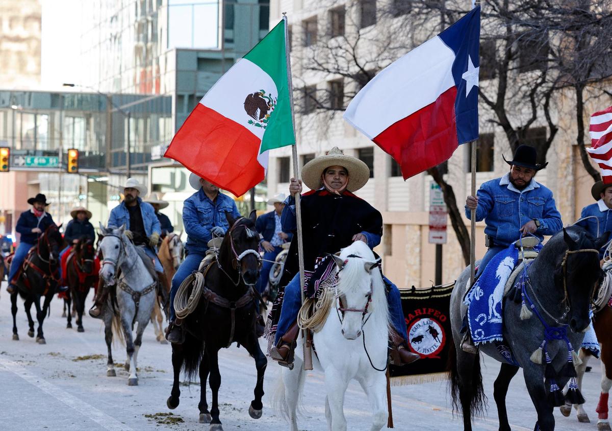 Riders make their way up Commerce St. during the Fort Worth Stock Show and Rodeo parade in Fort Worth, Texas, Saturday, Jan, 13, 2024. (Special to the Star-Telegram Bob Booth)