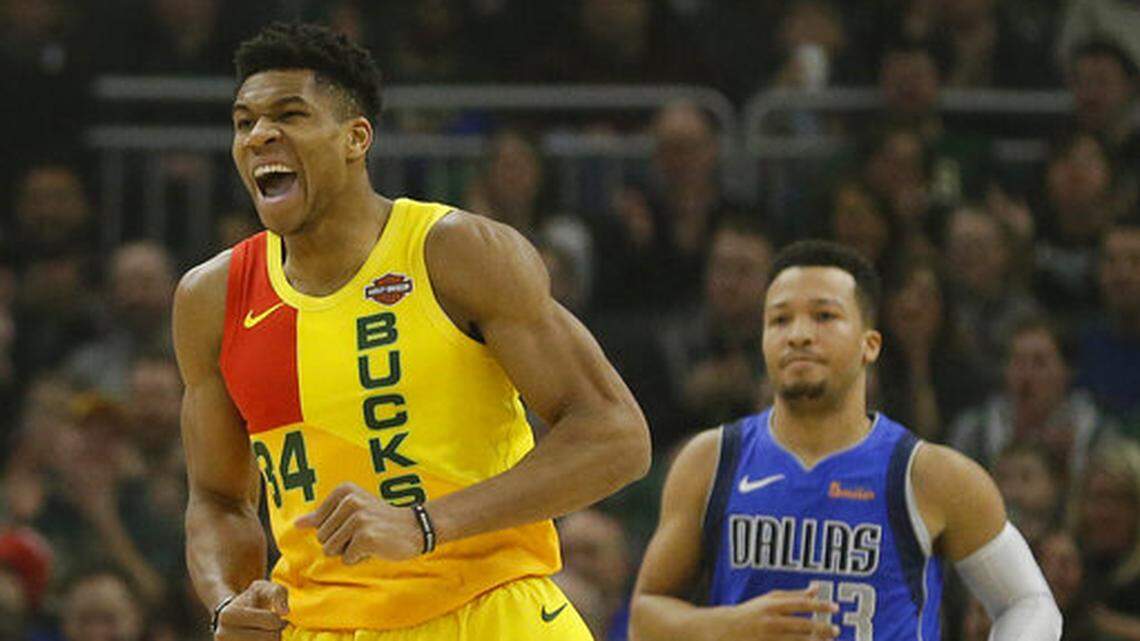 Milwaukee Bucks’ Giannis Antetokounmpo (34) reacts after a dunk during the first half of an NBA basketball game against the Dallas Mavericks Monday, Jan. 21, 2019, in Milwaukee. (AP Photo/Aaron Gash)