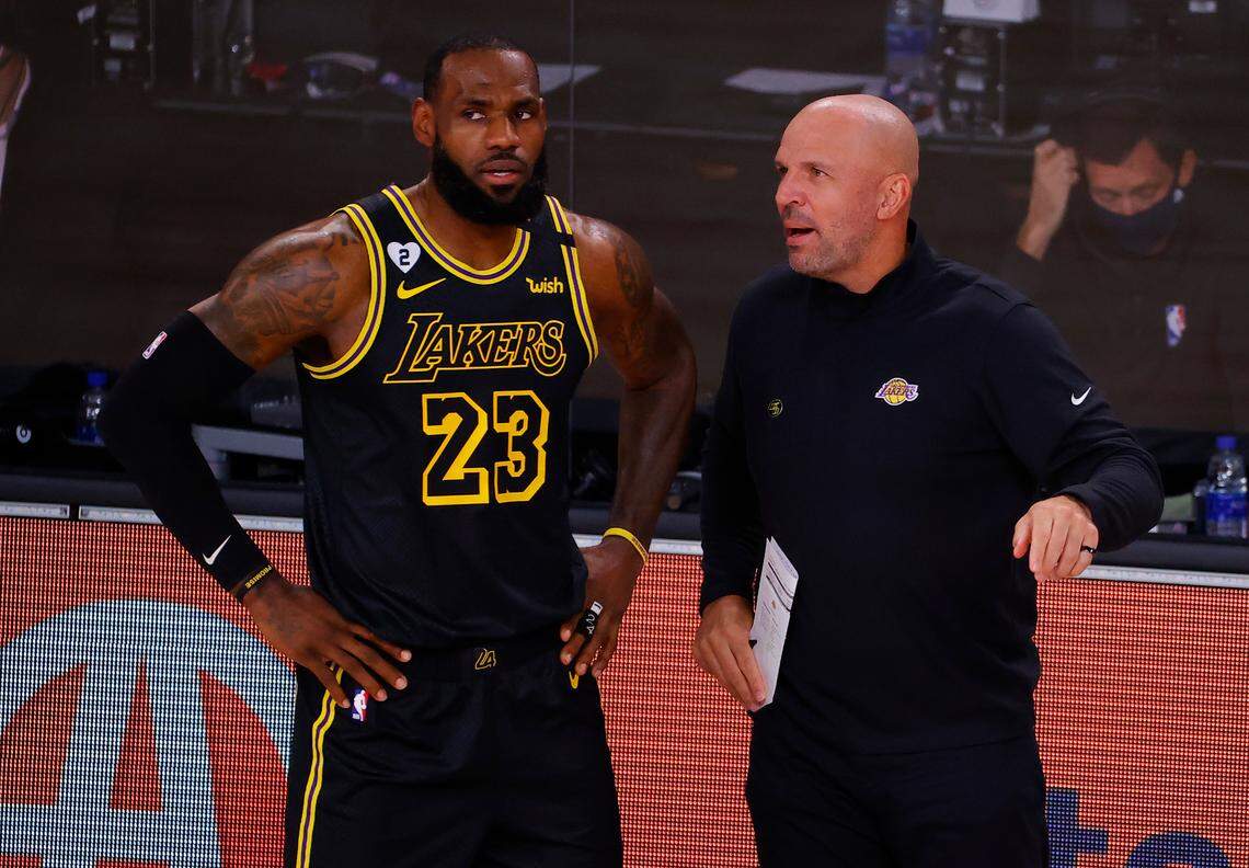 Los Angeles Lakers’ LeBron James (23) talks with Jason Kidd in Game 4 of an NBA basketball first-round playoff series against the Portland Trail Blazers, Monday, Aug. 24, 2020, in Lake Buena Vista, Fla. (Kevin C. Cox/Pool Photo via AP)