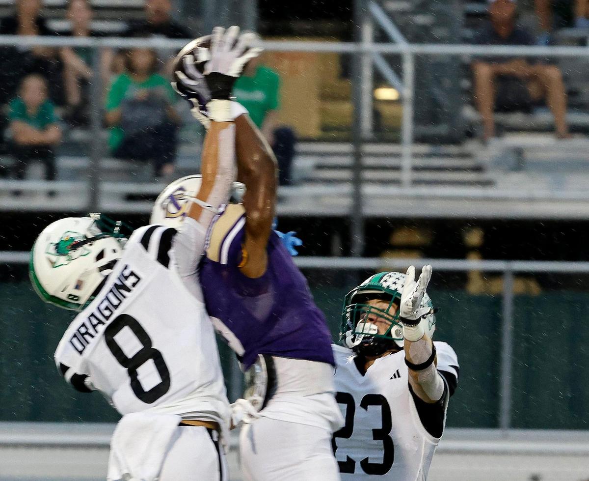 Carroll defensive back Carter High (8) breaks up a pass intended for Timber Creek wide receiver Cameron Hunter (6) in the first half of a UIL high school football game at Keller ISD Stadium in Keller, Texas, Thursday, Sept. 14, 2023.