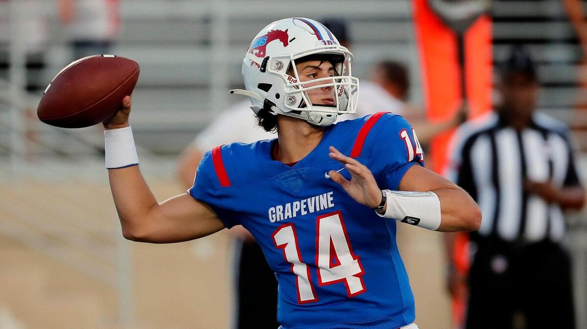 Grapevine quarterback Harrison Hackbarth (14) and the Mustangs will face off with Colleyville Heritage in Week 6.