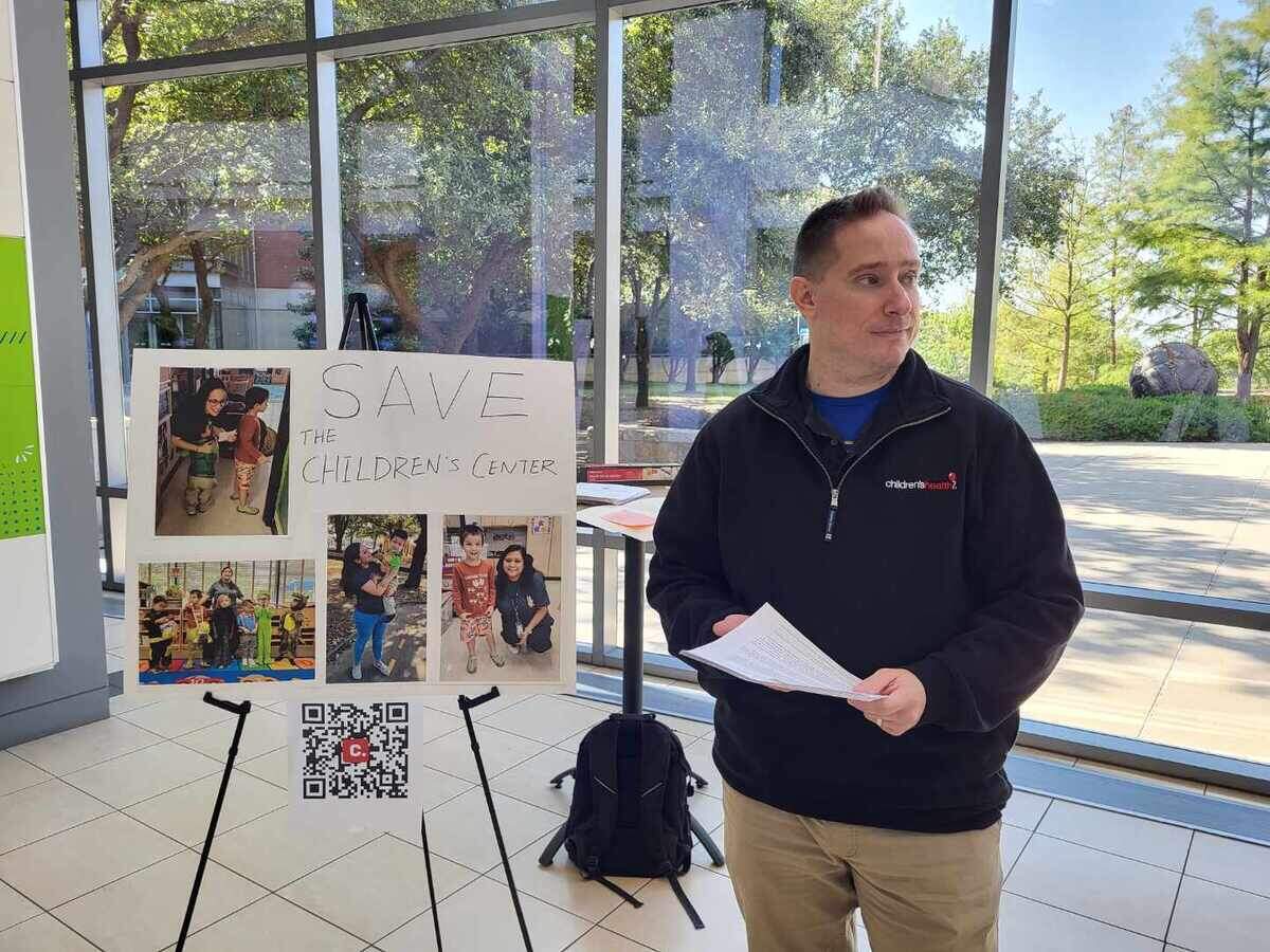 Jason Dziuk campaigns on Oct. 17 at the college’s Trinity River campus in downtown Fort Worth for Tarrant County College’s Children’s Center Laboratory School to be reopened.
