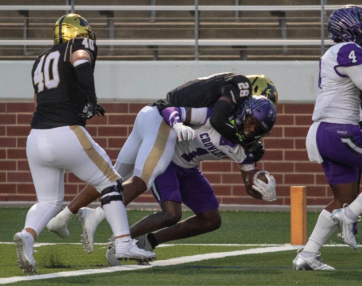 Crowley’s Antayvious Ellis scores for the Eagles during a UIL football game at Newsome Stadium on Saturday , October 10, 2024.