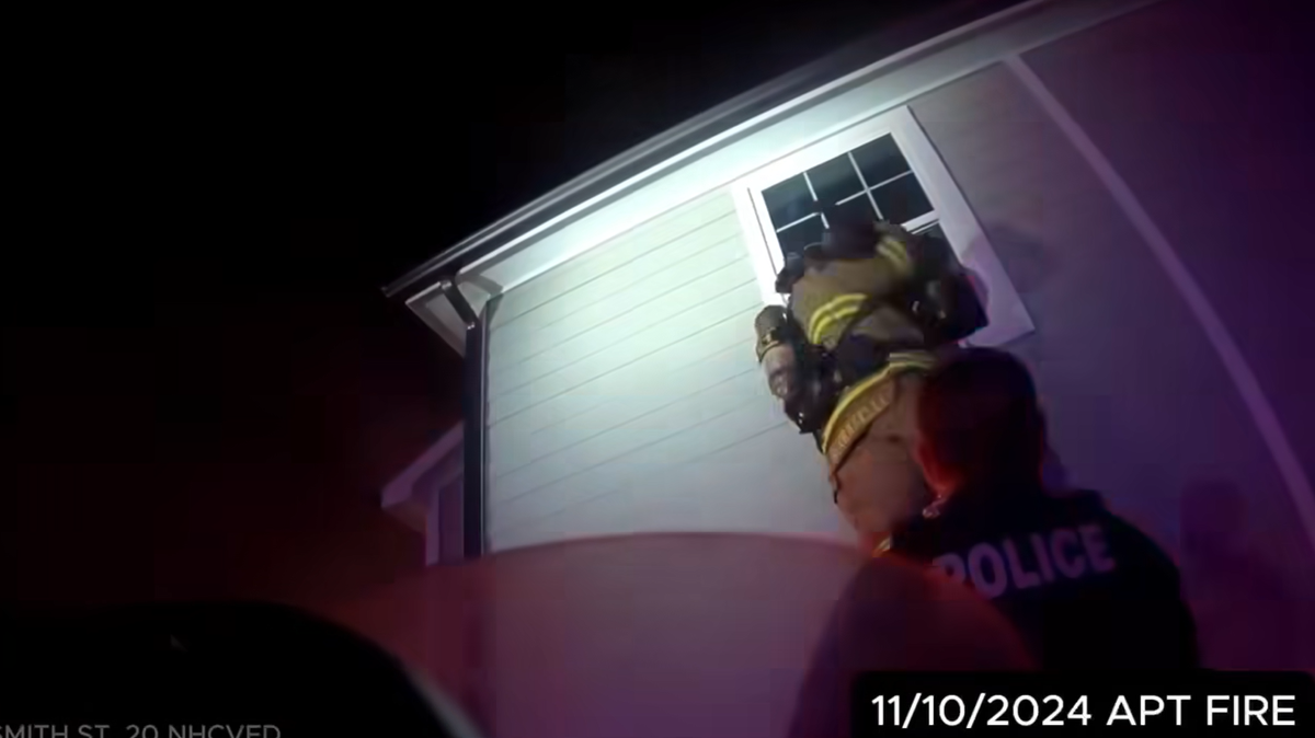 Granbury firefighters access a window to rescue a child early Sunday morning.