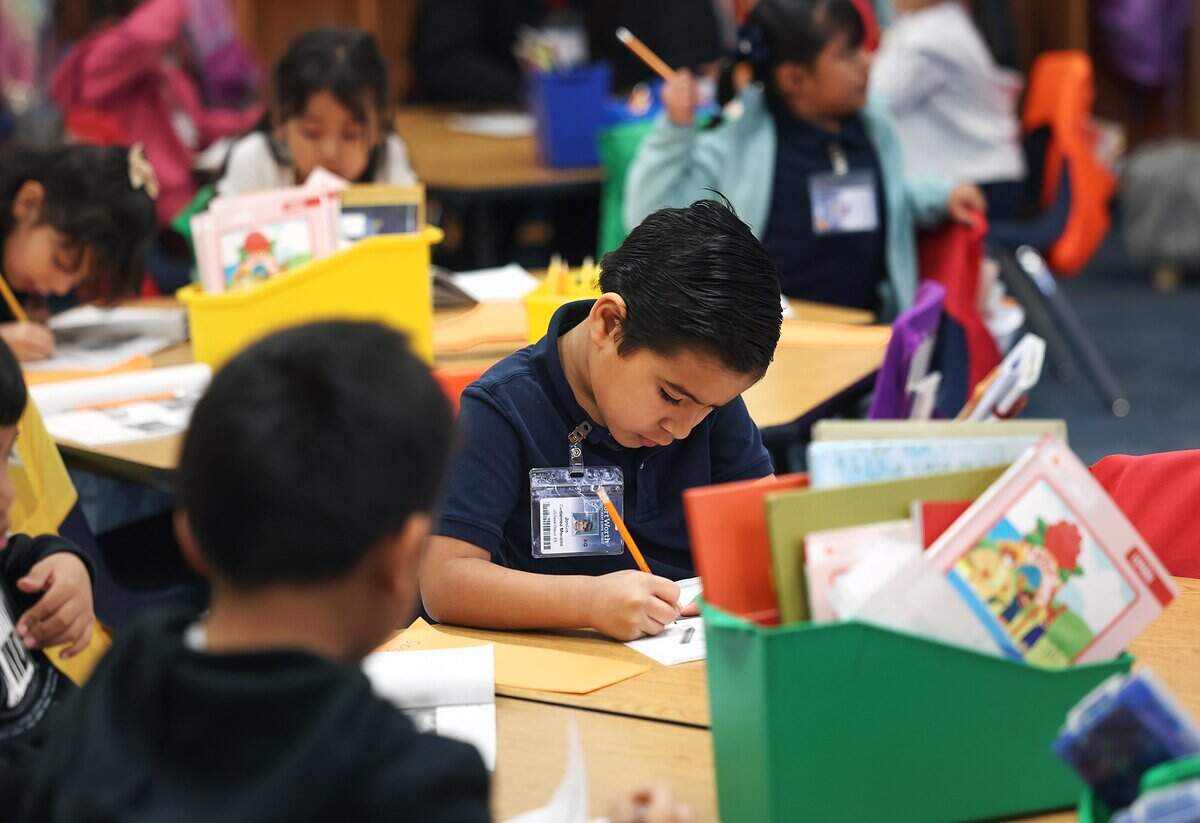 Kindergarten students at Caesar Chaves Elementary work on an assignment during class on Tuesday, Feb. 3, 2026, in Fort Worth.