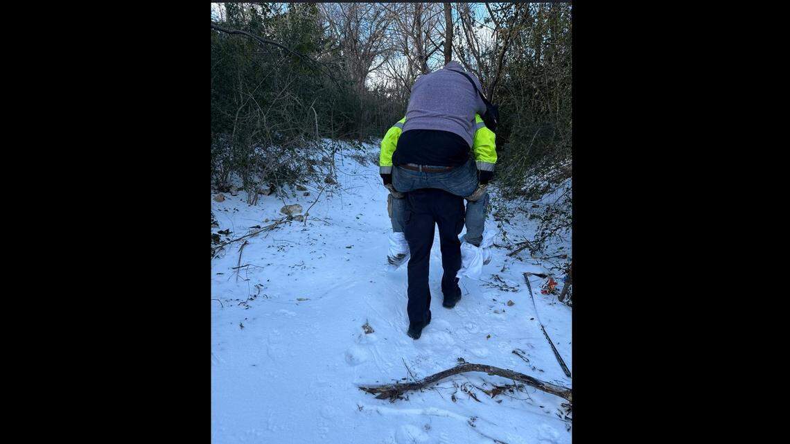 A homeless man suffering from hypothermia was physically carried to safety by Fort Worth firefighters Sunday during freezing temperatures, officials said. A homeless man suffering from hypothermia was physically carried to safety by Fort Worth firefighters Sunday during freezing temperatures, officials said.