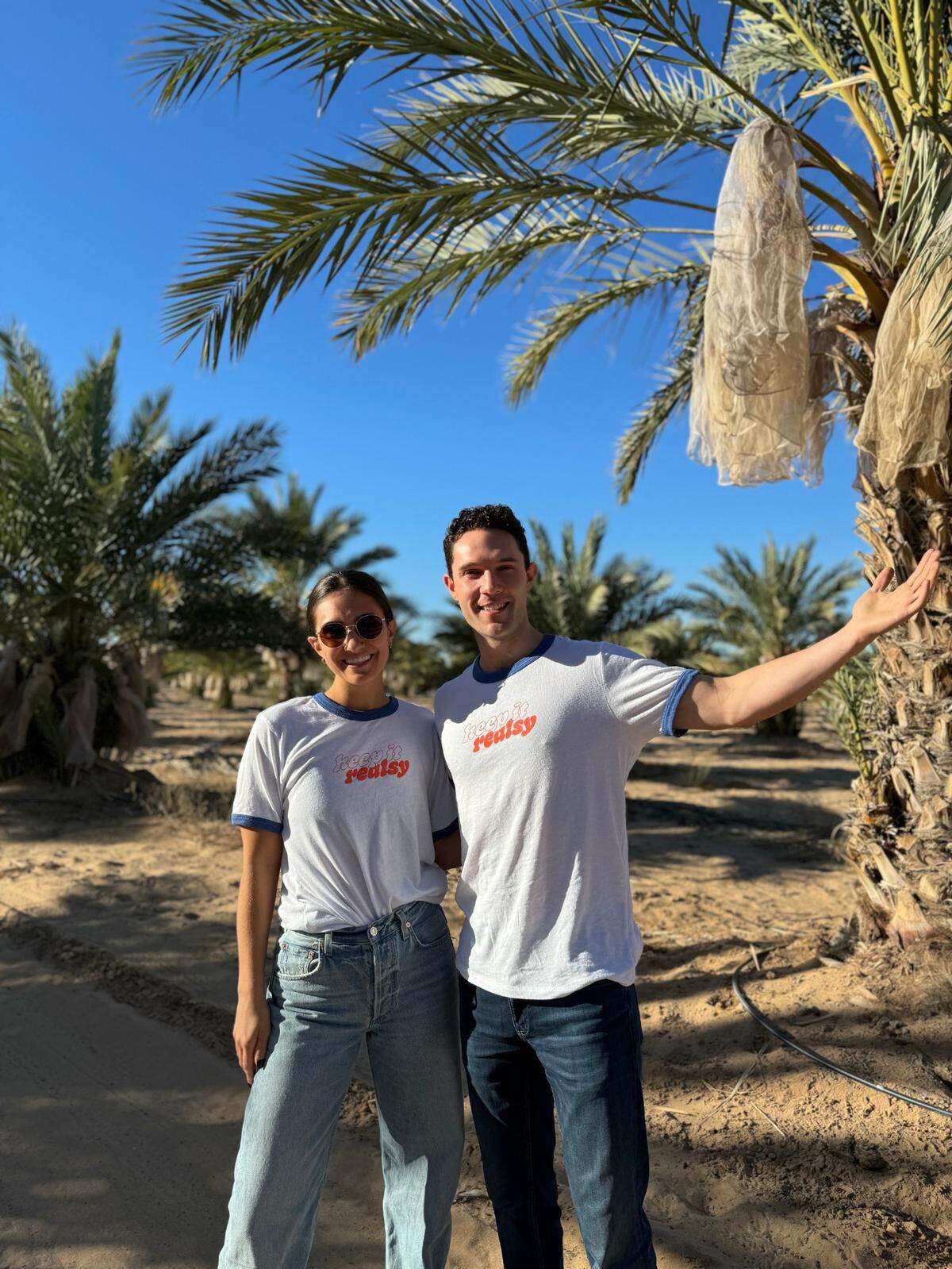 Sophia Karbowski and Austin Patry at the date farm where they source their ingredients for nut butter filled dates.