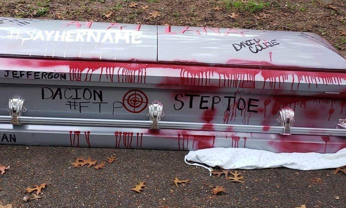 A casket painted with the names of Atatiana Jefferson and other people who were shot and killed by Fort Worth police officers was thrown in the yard of Mayor Mattie Parker on Saturday, Dec. 10, 2022, according to a police report. 
