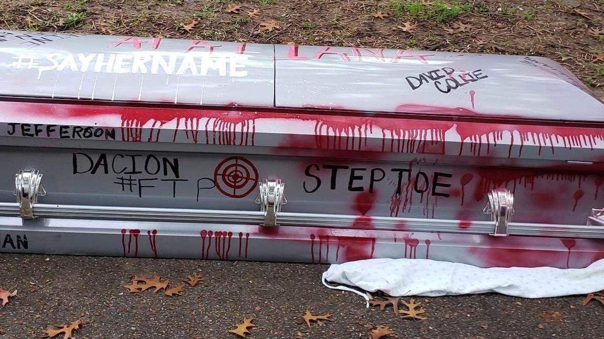 A casket painted with the names of Atatiana Jefferson and other people who were shot and killed by Fort Worth police officers was thrown in the yard of Mayor Mattie Parker on Saturday, Dec. 10, 2022, according to a police report. Former officer Aaron Dean is currently on trial for murder in Jefferson’s death.