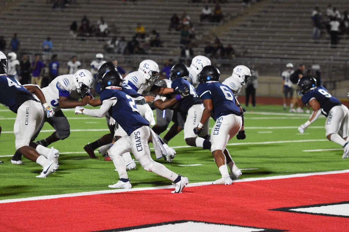 O.D. Wyatt and Dallas Lincoln during a high school football game at Clark Stadium in Fort Worth, Texas Friday, August 25, 2023.