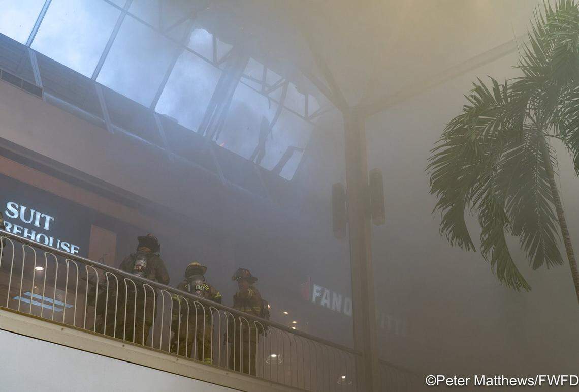 Fort Worth firefighters respond to a two-alarm fire at Hulen Mall on Friday night, June 27. Shoppers and employees were evacuated from the mall.