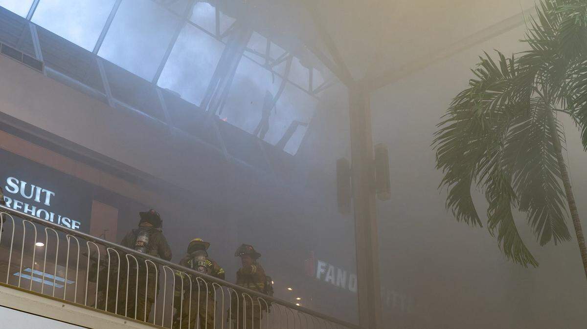 Fort Worth firefighters respond to a two-alarm fire at Hulen Mall on Friday night, June 27. Shoppers and employees were evacuated from the mall.