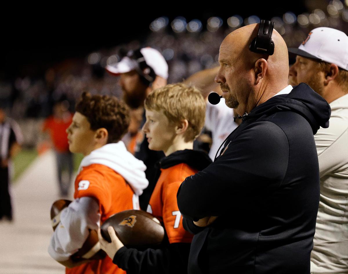 Aledo head coach Robby Jones watches the final minute of the second half of a UIL Conference 5A Division I Semifinal football playoff game at Midlothian ISD Stadium in Midlothian, Texas, Friday, Dec. 08, 2023.