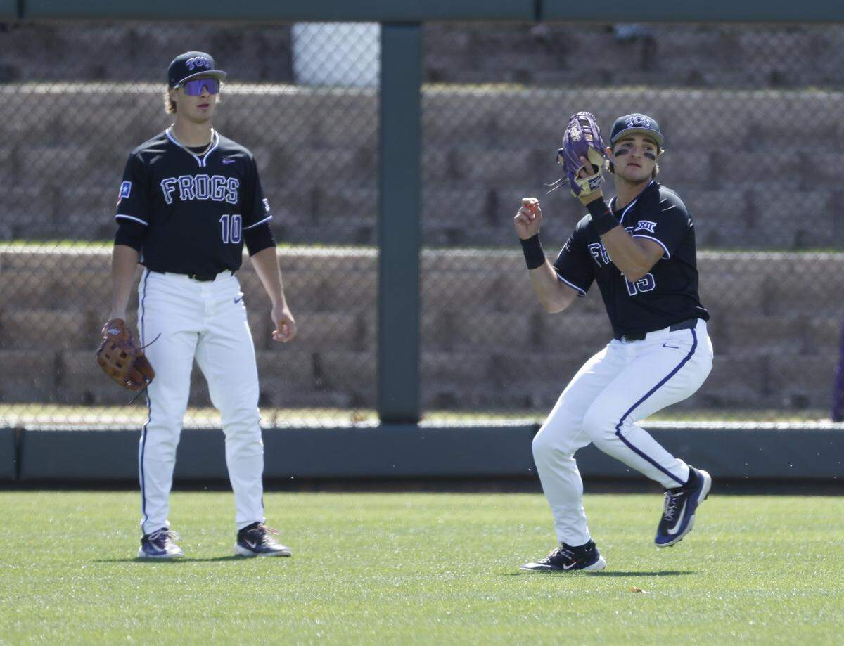 TCU right fielder Chase Brunson (15) catches a fly ball in front of center fielder Sawyer Strosnider (10) during an NCAA baseball game against New Mexico State at Lupton Field at TCU in Fort Worth, Texas, Tuesday, March, 17, 2026.