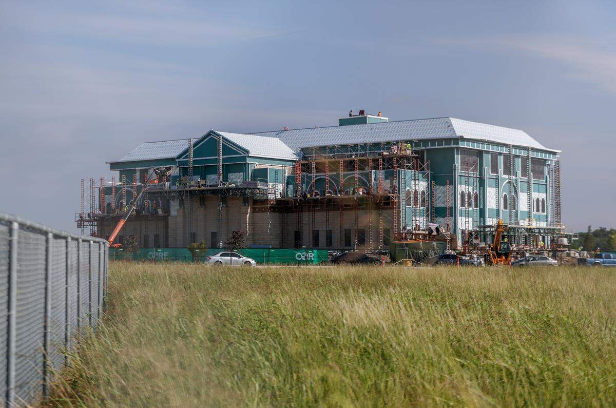 Construction workers work on the new Mansfield City Hall in north Mansfield on June 3, 2026. The new city hall will be 28,000 square feet larger than the current facility.