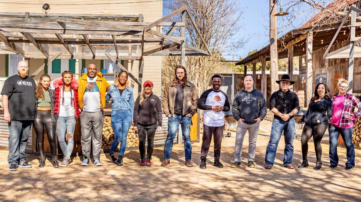 Brendan Lamb of Smiley’s in Roanoke, center, on Season 2 of “BBQ Brawl” with chefs (from left) David Sandusky, Taylor Carroll, Christina Fitzgerald, Max Hardy, Brittany Bo Baker, Megan Day, Terry Matthews, Christopher Prieto, Ara Malekian, Erica Blaire Roby and Lu Holter.