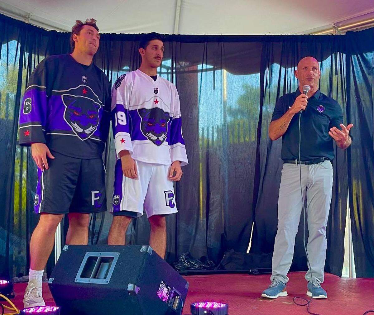 Panther City players Charlie Kitchen (Left) and Phil Caputo along with head coach Tracey Kelusky during the team’s jersey unveiling in Fort Worth on Wednesday Aug. 11, 2021.