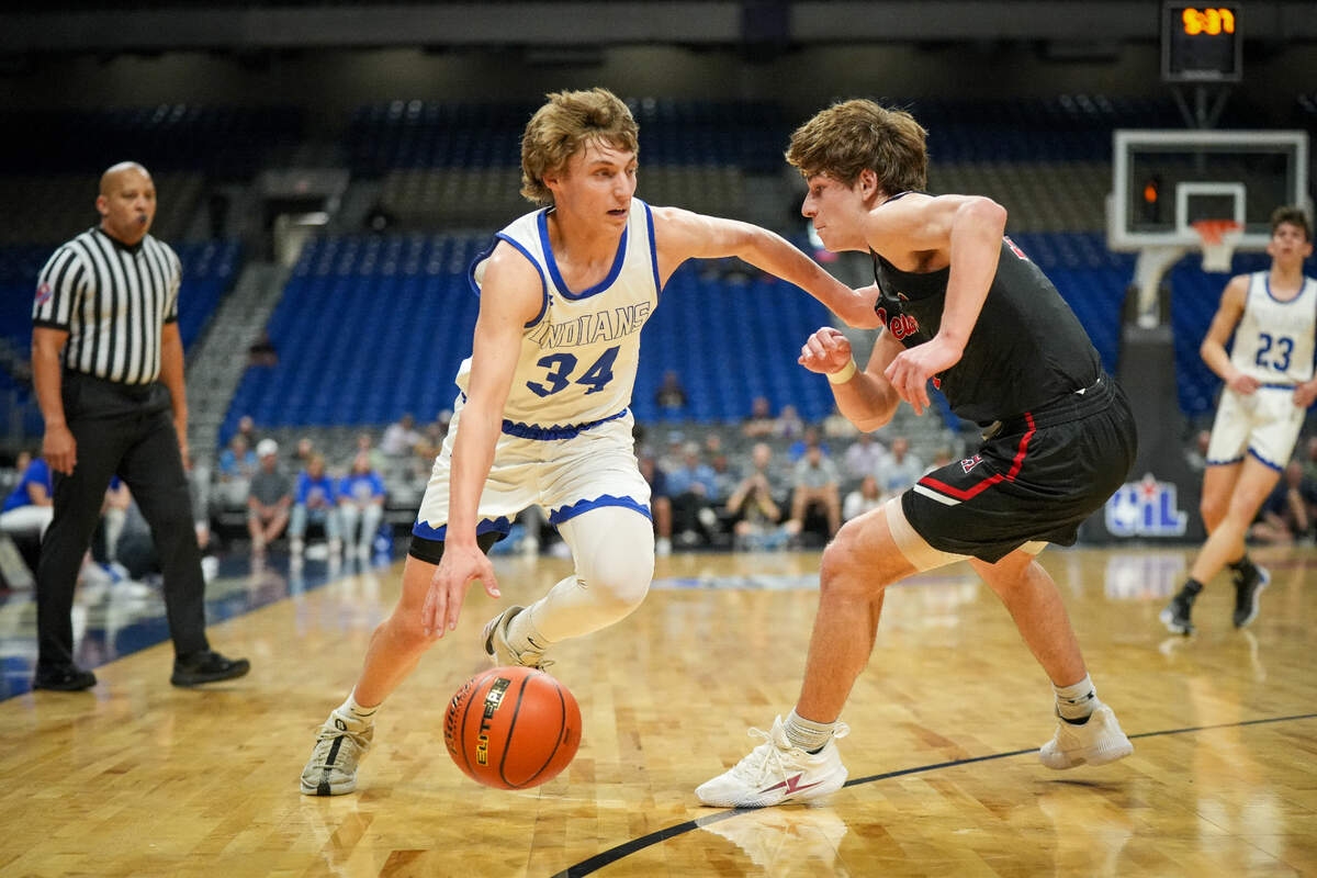 Lipan’s Court Gaylor drives to the basket for two of his game-high 27 points against New Home in a Class 2A state semifinal on Friday, March 8, 2024 at the Alamodome in San Antonio, Texas. Lipan defeated New home 40-39 in overtime.