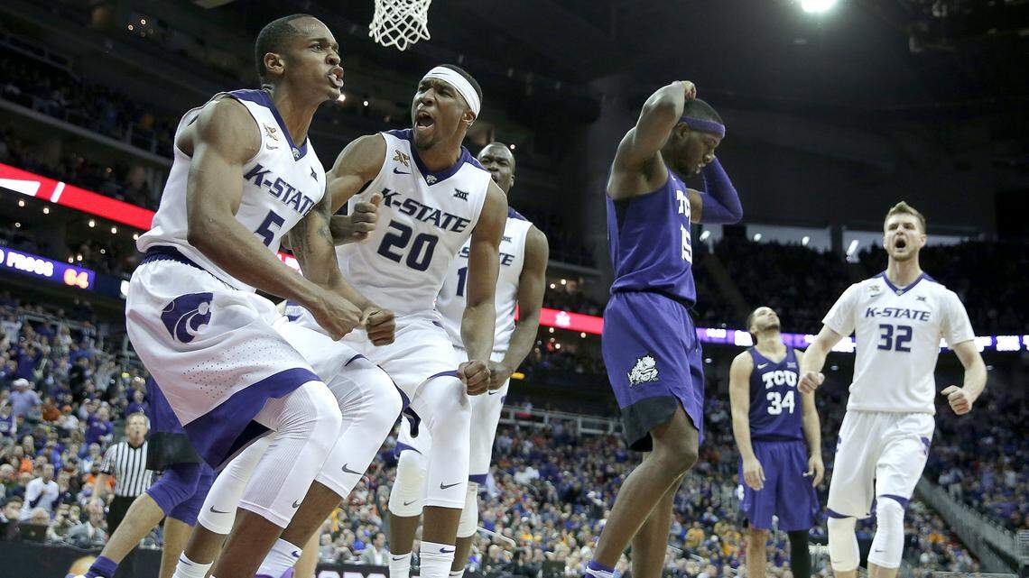 Kansas State's Barry Brown and Xavier Sneed celebrate after a basket during the Wildcats' overtime win over TCU Thursday in the Big 12 tournament.