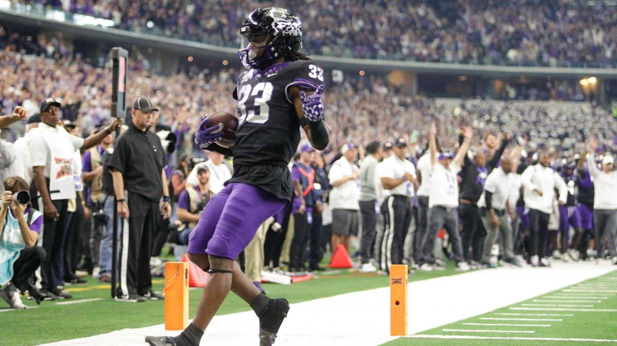 TCU running back Kendre Miller runs the ball into the end zone during the Big 12 Championship against Kansas State on Dec. 3.