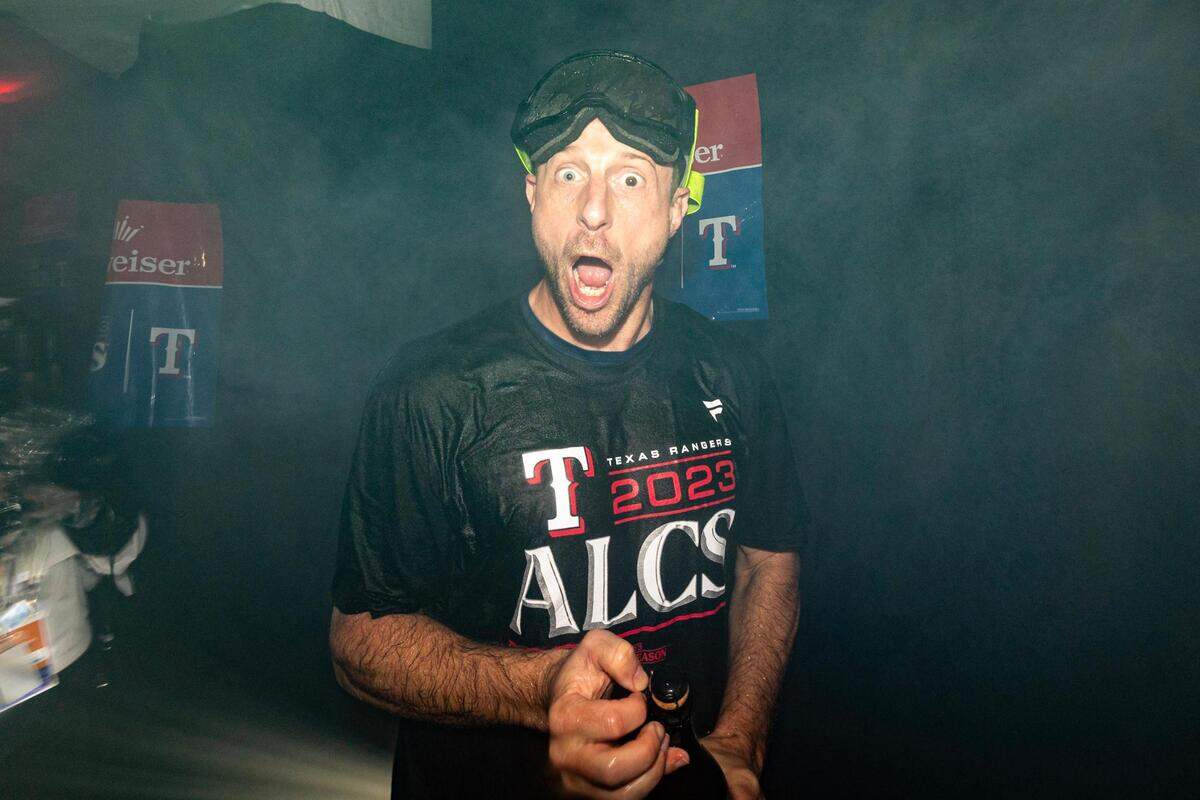 Texas Rangers pitcher Max Scherzer celebrates a win with his teammates in game three to clinch the ALDS between the Texas Rangers and Baltimore Orioles at Globe Life Field in Arlington on Tuesday, Oct. 10, 2023.
