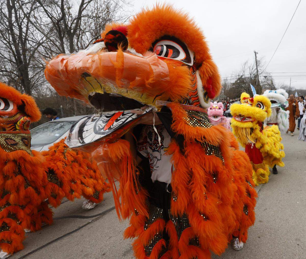 Dragon dancers greeted the Buddhist monks who walked nearly 2,300 miles to Washington, D.C., for peace as they arrived back at the Húóng Dao Vipassana Bhavana Center in Fort Worth, Texas, on Saturday, Feb. 14, 2026.