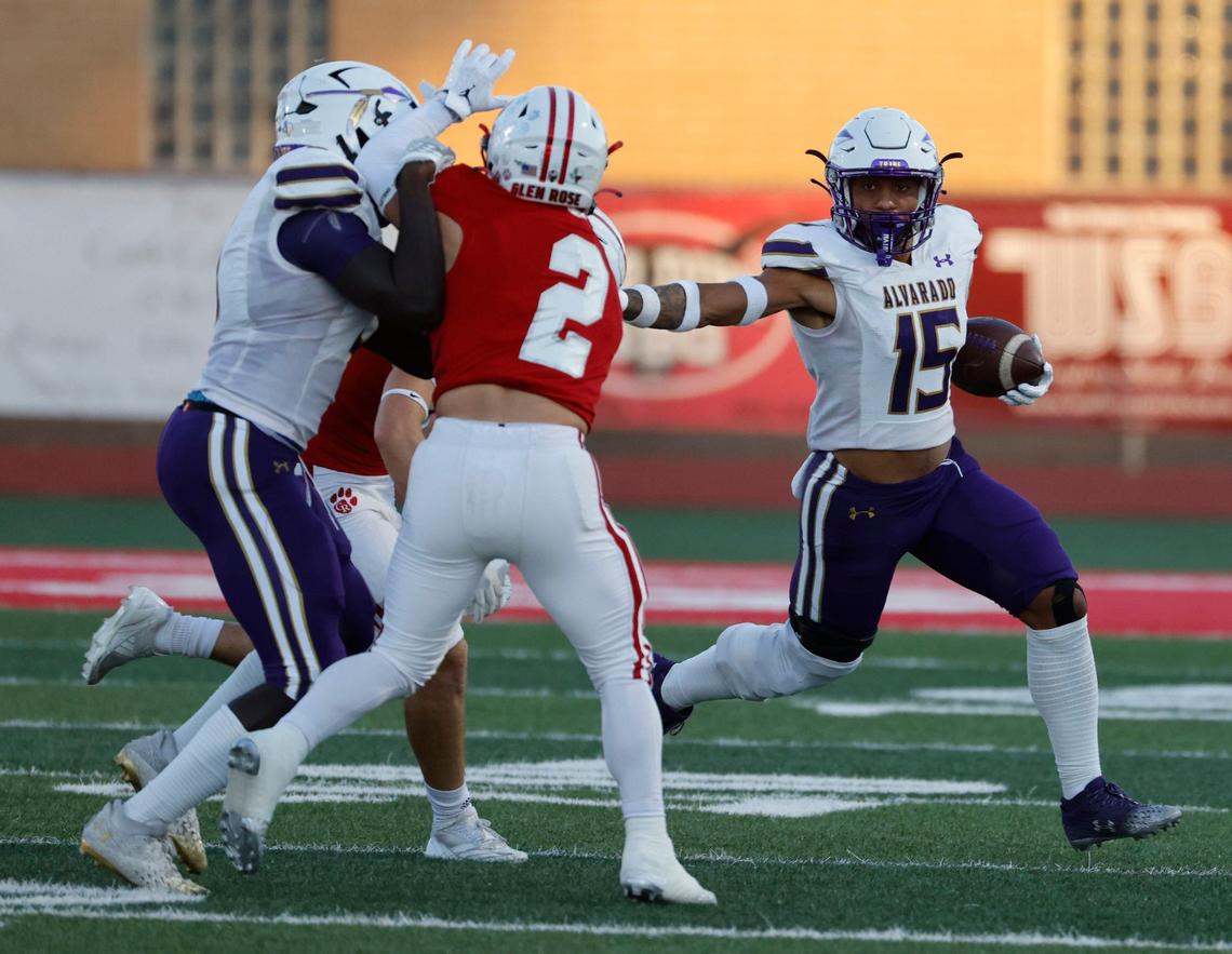 Alvarado wide receiver Lance Sansom (15) sweeps to the left during a UIL football game at Tiger Stadium in Glen Rose Texas, Friday, Sept. 27, 2024.