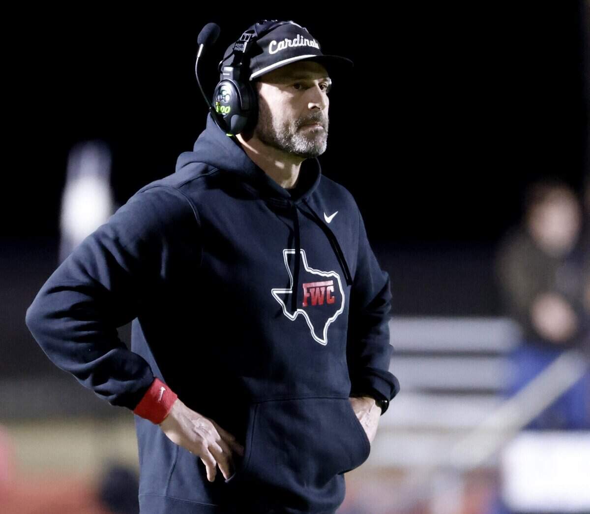 Fort Worth Christian head coach Brady Gunn roams the sidelines during the first half of a TAPPS football game between Fort Worth All Saints and Fort Worth Christian at Barrow Field in North Richland Hills, Texas, Friday, October 31, 2025.