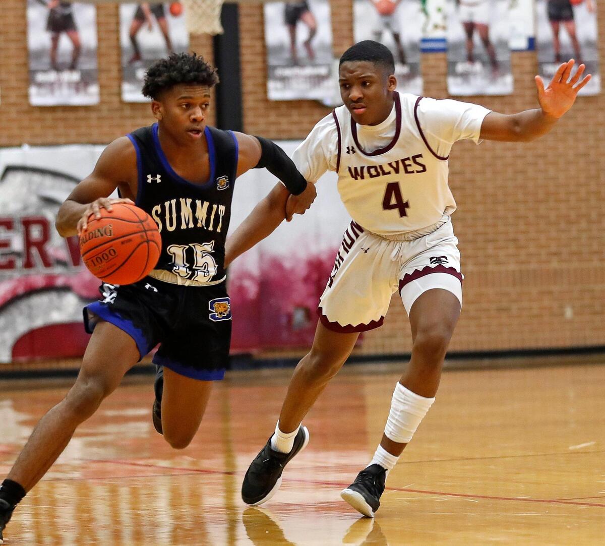 Timberview guard Donovan O’Day (4) shadows Summit guard Maxwell Jones (15) down court during a high school basketball game at Timberview High School in Arlington, Texas, Tuesday, Jan. 05, 2021. Summit Jaguars defeated the Timberview Wolves 64-62. (Special to the Star-Telegram Bob Booth)