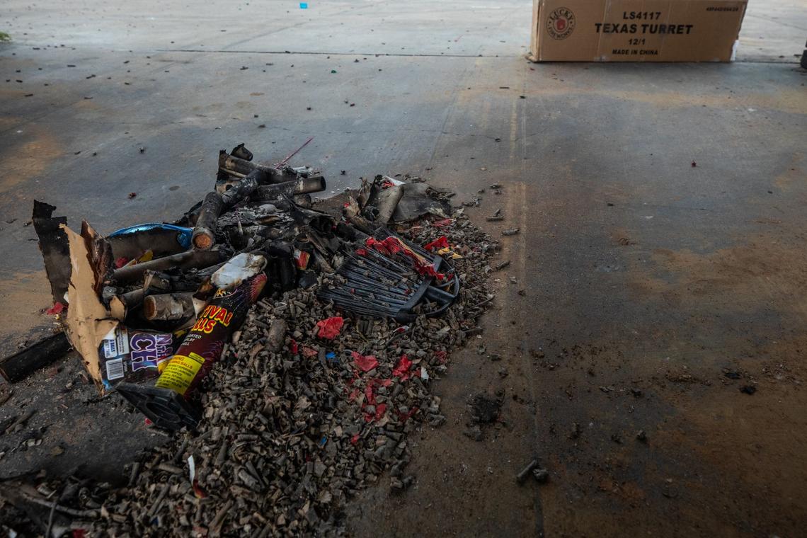A pile of firework debris in one of the lots of the Crystal Clean Car Wash on Friday, July 5, 2024 in Fort Worth. A fatal shooting took place the night prior.