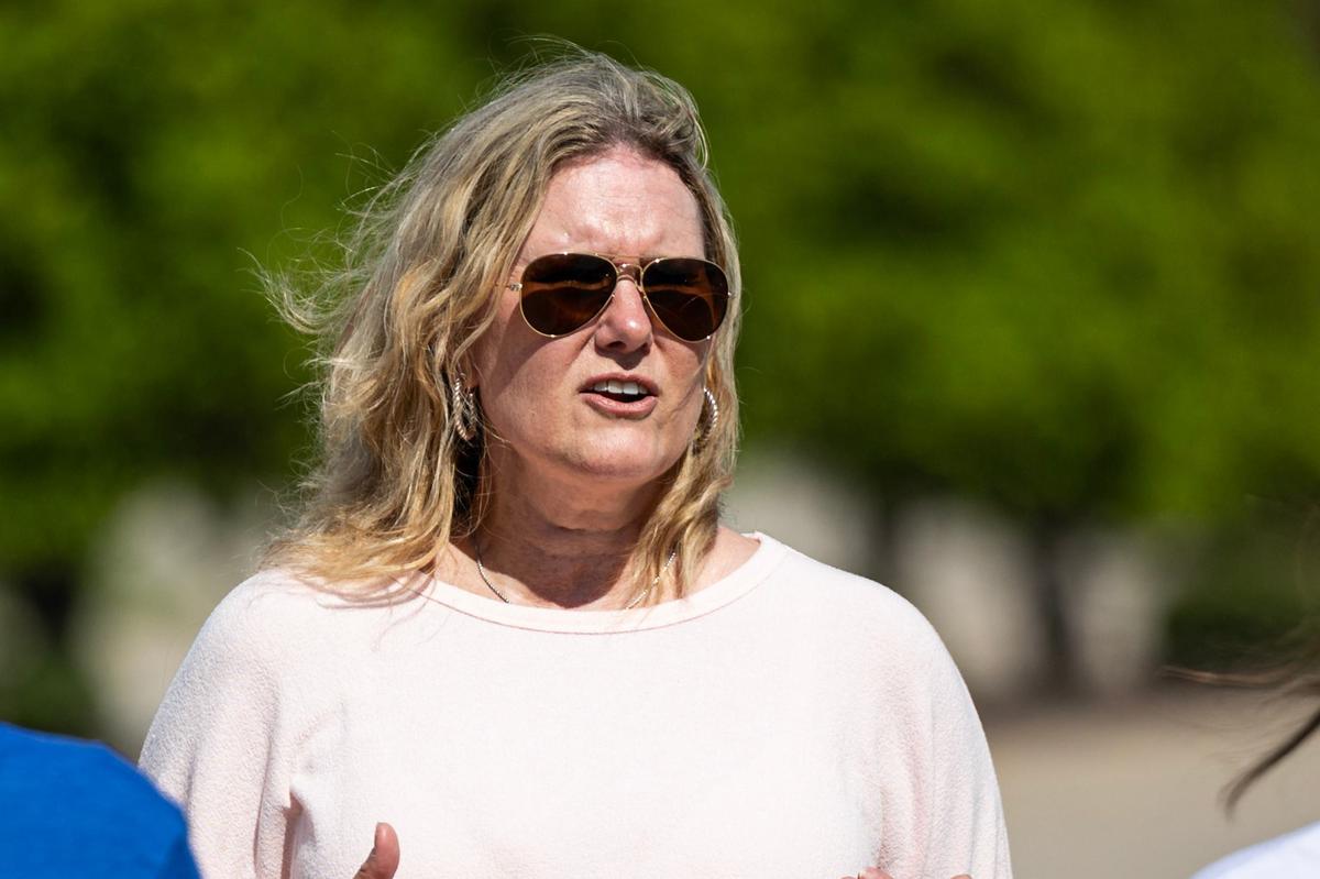Amy Smith, an activist against sexual abuse in the church, speaks to the media about protesting against child and sexual abuse in the church outside of Gateway Church in Southlake on Saturday, June 22, 2024.