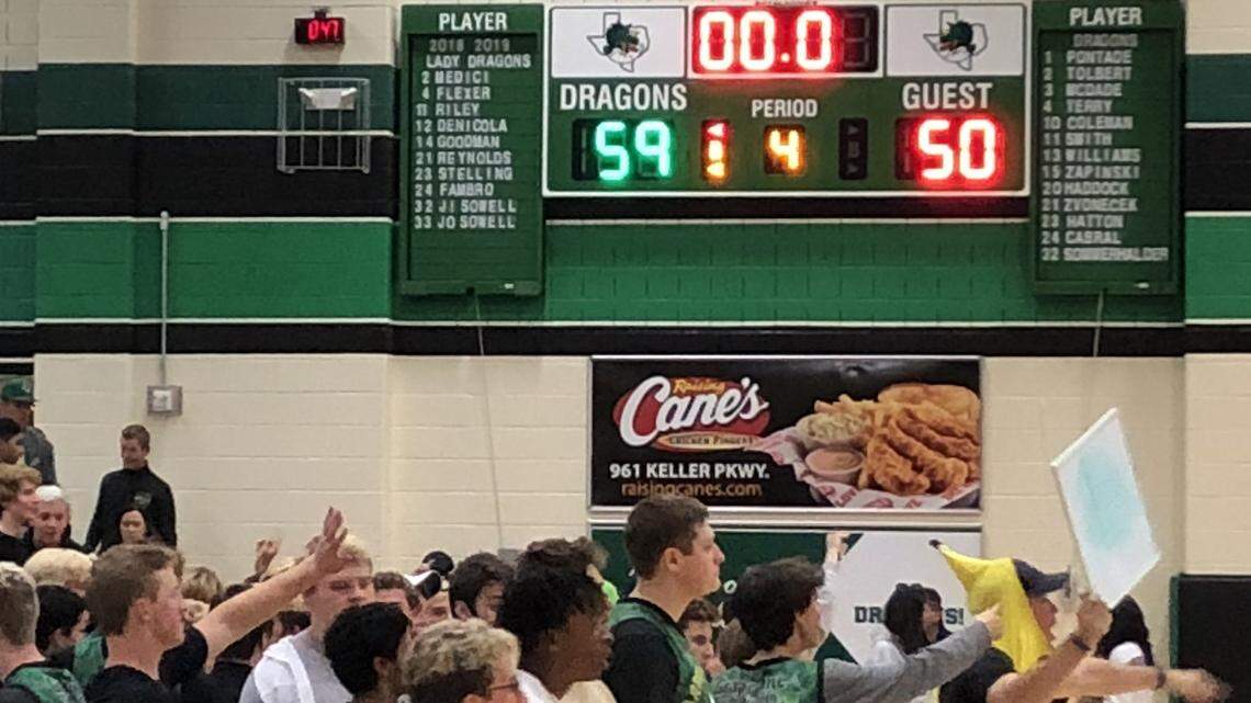 Carroll students celebrate a 59-50 win over Keller, Friday Feb. 8, 2019.
