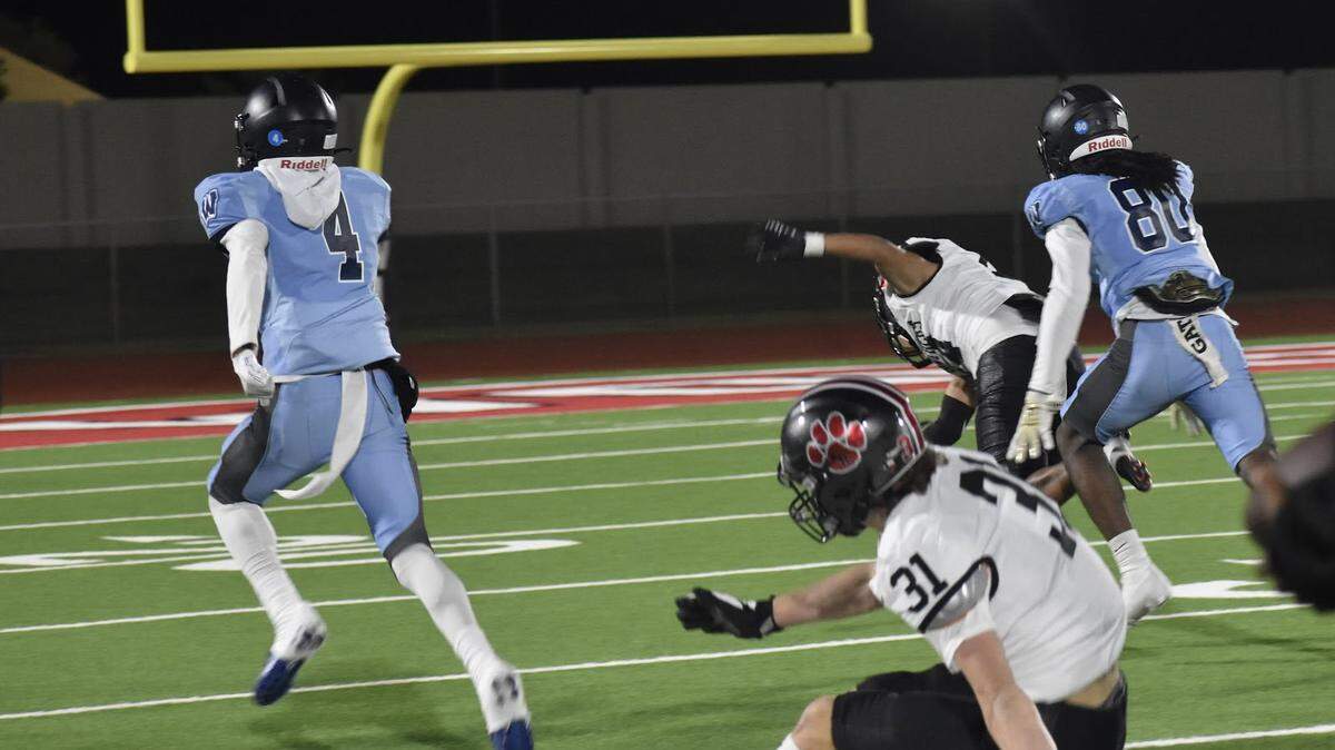 Boone (4) carries the ball for the Chapparals during a high school football game against Colleyville Heritage at Clark Stadium in Fort Worth, Texas Thursday, November 2, 2023.