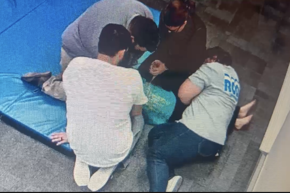 Staff at a Weatherford elementary school restrained a 7-year-old on the autism spectrum multiple times per day within a 53-day period, according to a lawsuit from the student’s mother. In this screen grab from surveillance footage, four staff members assist in holding the child down because, according to his mother, the child bit his own arm.