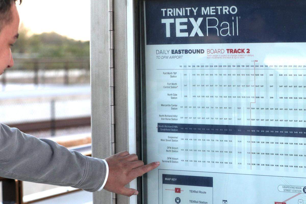 Christian Munoz points to the last stop on the TexRail on Tuesday, Nov. 1, 2022, in North Richland Hills. Munoz traveled to that stop for five months when he didn’t have a car, only to walk another mile to his job.