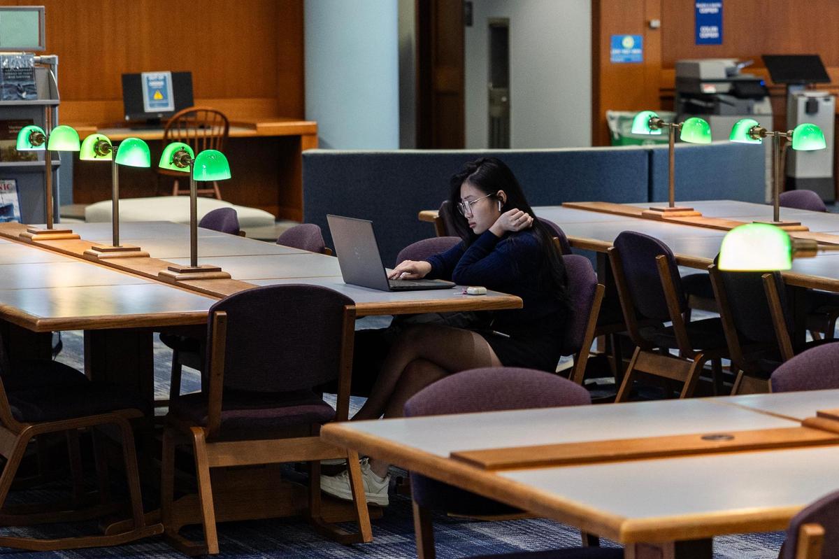 Junior Ngoc Bao Tran Nguyen studies in the Eunice and James L. West Library at Texas Wesleyan University on Tuesday, April 8, 2025.