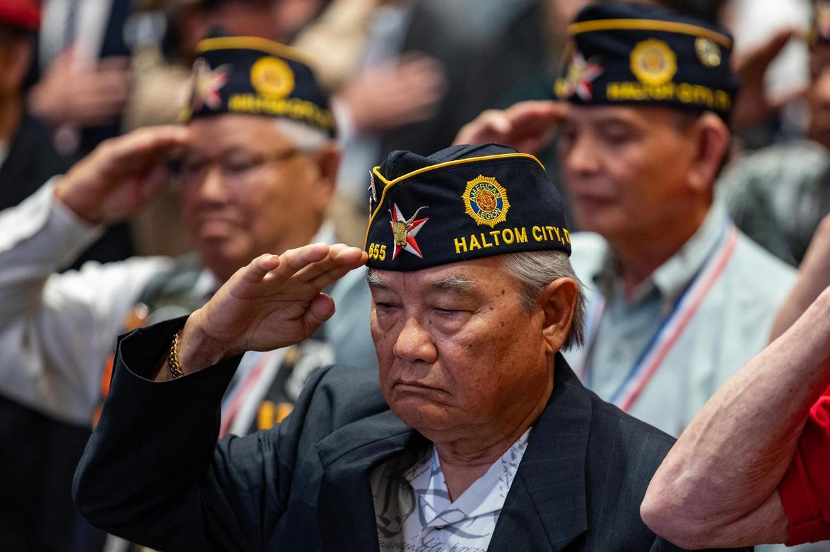 Vietnam War veteran James Boudtaroth salutes during the national anthem with other veterans in attendance of the 50th Anniversary of the Vietnam War event at Haltom City City Hall in Fort Worth on Wednesday, April 30, 2025.