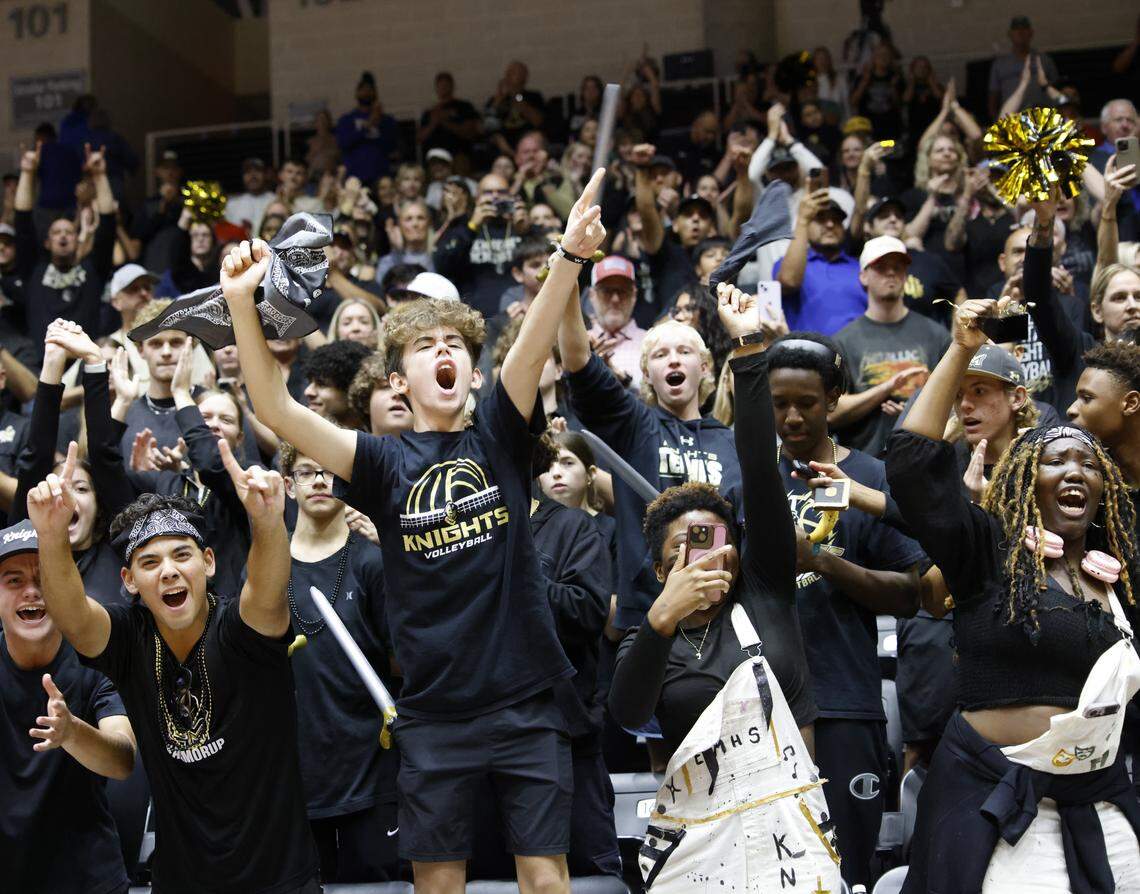Fort Worth Eagle Mountain Knights fans celebrate their team winning the UIL Class 4A Division II state volleyball championship game against Wimberley Friday Nov. 21, 2025 at Curtis Culwell Center in Garland, Texas.