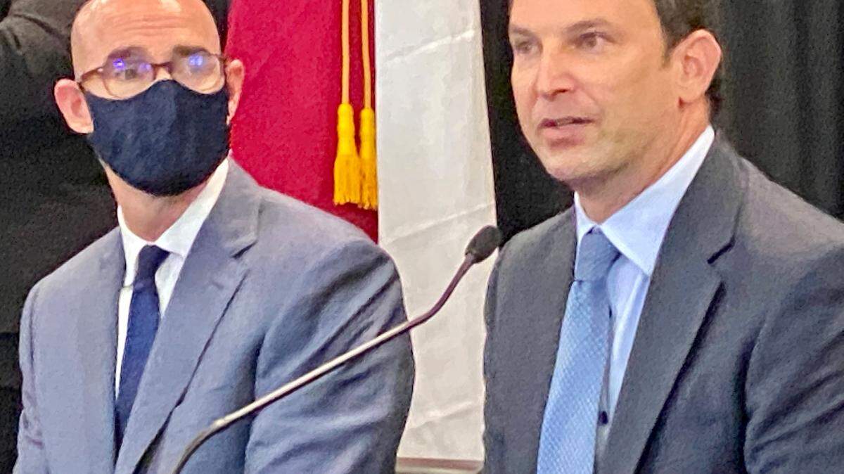 State Rep. Craig Goldman, R-Fort Worth, talks as House Speaker Dennis Bonnen, R-Angleton, looks on at a Gov. Greg Abbott press conference in Fort Worth.