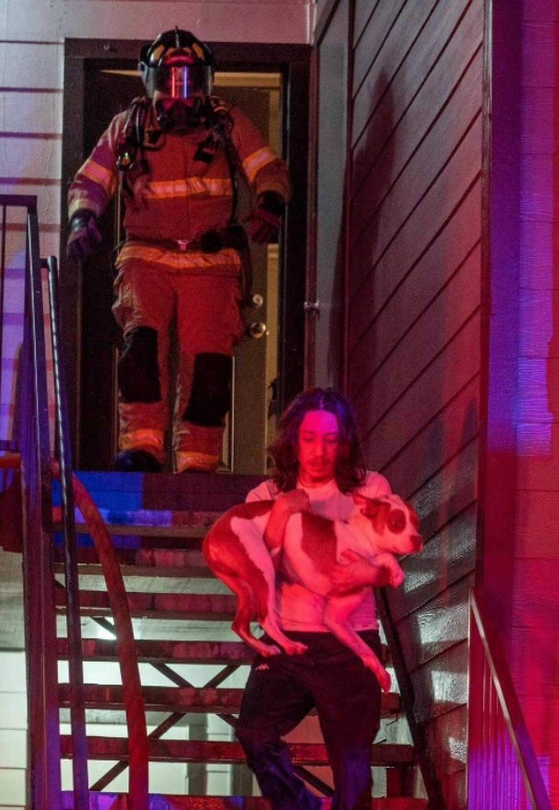 Residents and pets had to scramble out of a Fort Worth apartment building early Tuesday when a fire roared through a complex, fire officials said.