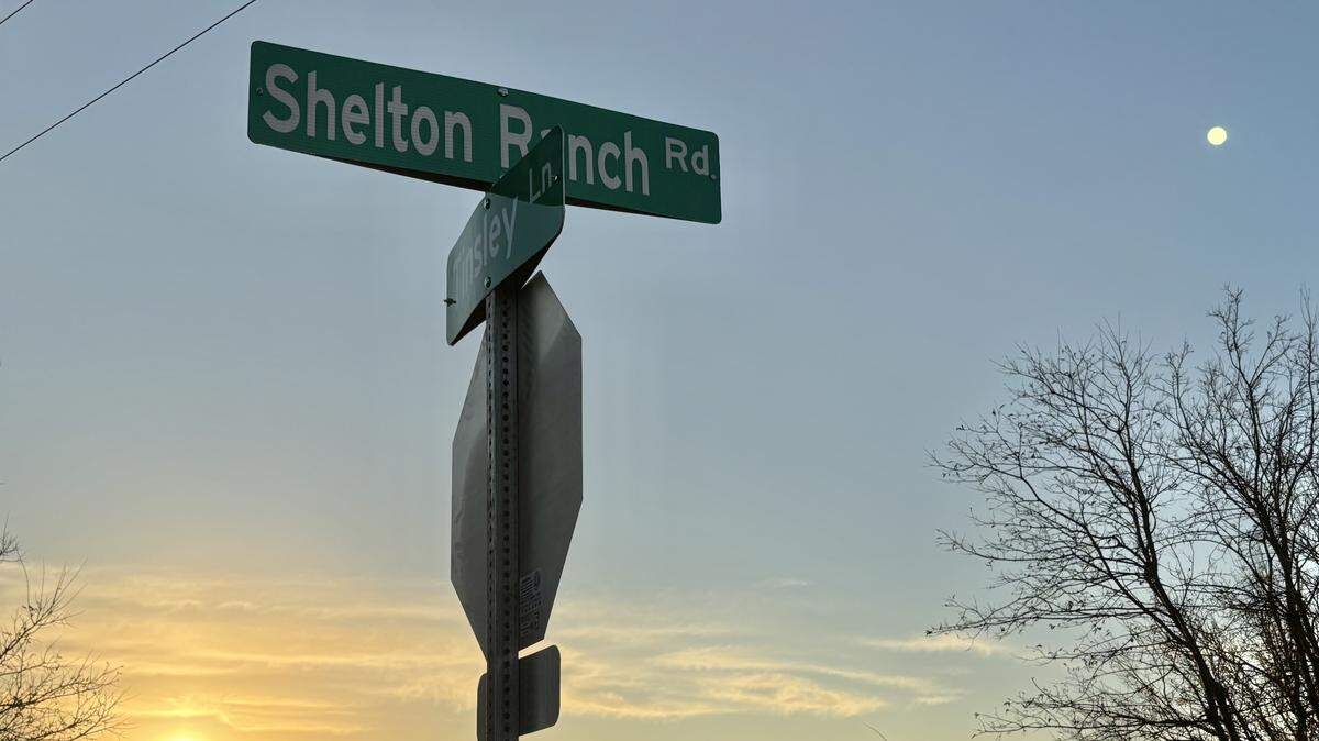 Commissioner Manny Ramirez cut the ribbon on Shelton Ranch Road as the sun came up Dec. 18, 2025. Residents of the Vista Ranch neighborhood on Tinsley Lane have been halted for hours at a time because of the trains blocking the one entrance to their community.