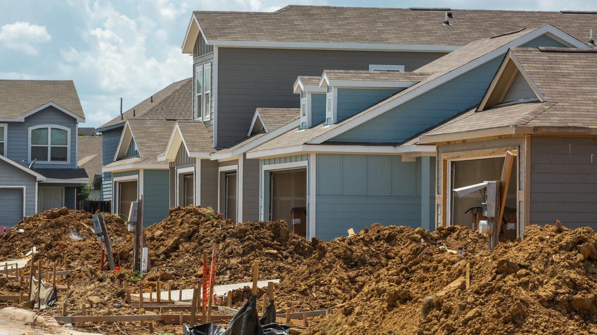 A line of houses in south Fort Worth under construction. Home sales slumped in June across the state, unusual market movement during the summer.
