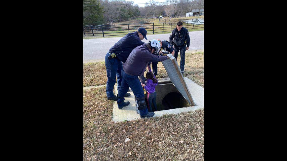 The Southlake Police and Fire Departments helped rescue Tori, 11, from a drainage pipe on Wednesday. Tori was trapped from crawling out by a couple of snakes.