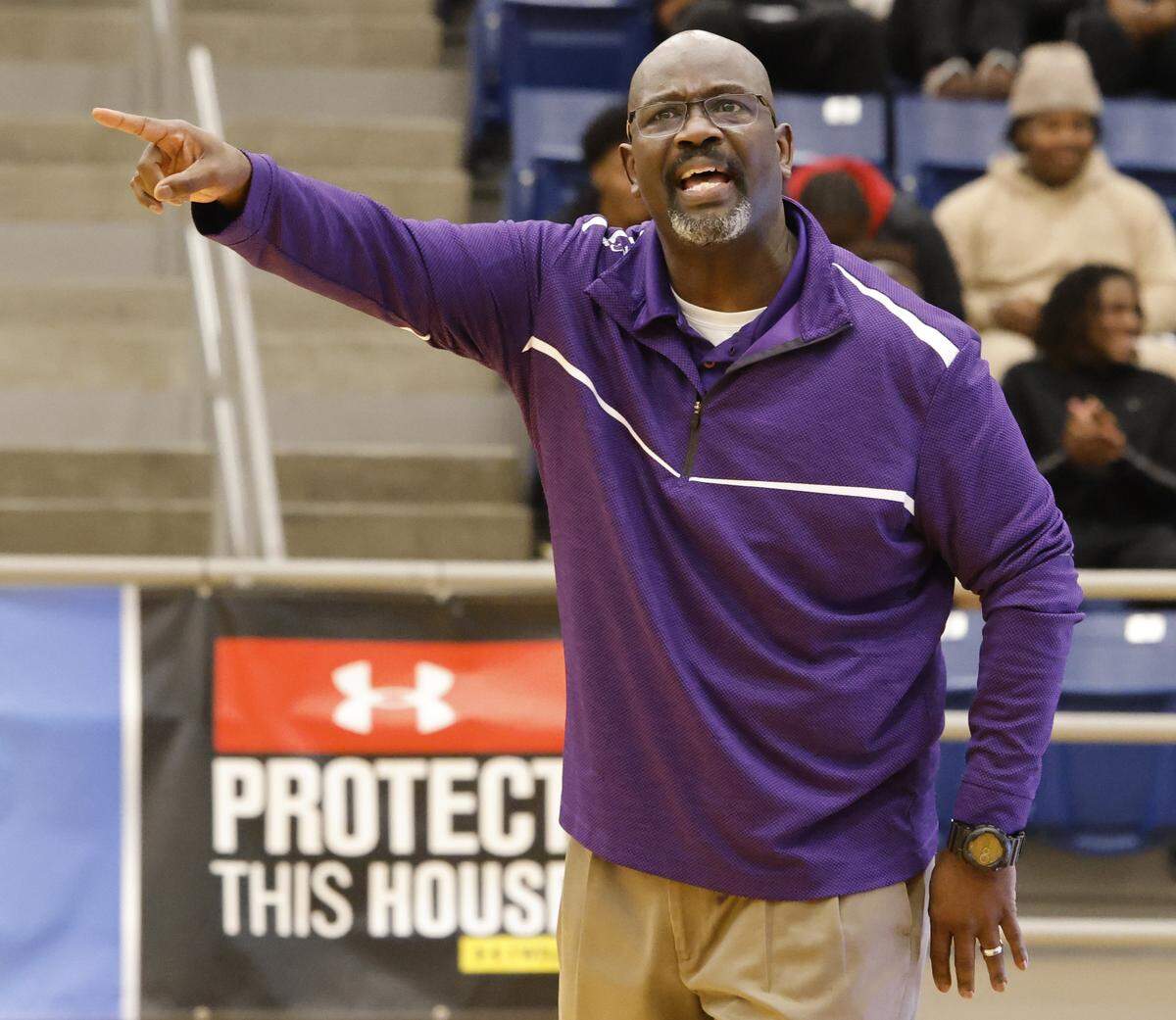 Everman head coach Jon Wagner gestures during their game against Mansfield Summit in the second half of a UIL boys basketball game between Everman and Mansfield Summit at Summit High School in Mansfield, Texas, Thursday Jan. 22, 2026