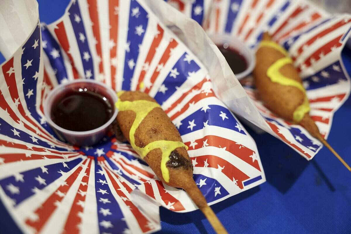 Fletcher's Chocolate Corny Dog wins in the sweet category during the Big Choice Tex Awards on Tuesday, Aug. 18, 2026 in Dallas. The dish is chocolate fudge dipped in Fletcher's corn dog batter with a drizzle of yellow vanilla icing and served with raspberry compote.