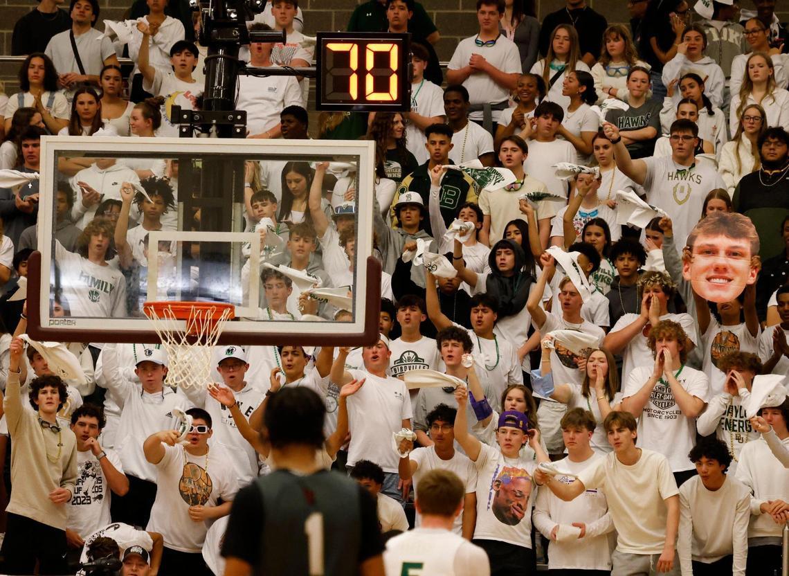 Birdville Hawk fans celebrate during the first half of the UIL 5A state semifinal playoff basketball playoff game at Lewisville High School in Lewisville Texas, Tuesday, Mar. 04, 2025.
