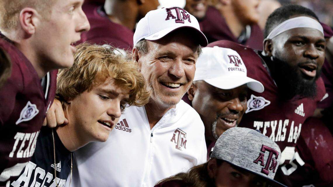 Despite a worthy resume Texas A&M and coach Jimbo Fisher (center) are on a path to be left out of the 2020 College Football Playoff.