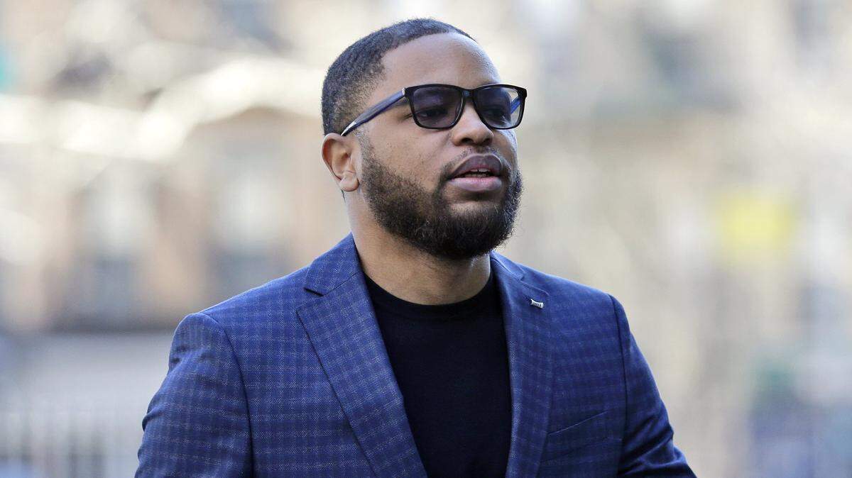 In this March 5, 2019, file photo, Christian Dawkins arrives at federal court in New York. A prosecutor says greed led a fledgling manager of basketball players to bribe college coaches, but defense lawyers say it was all an FBI setup.