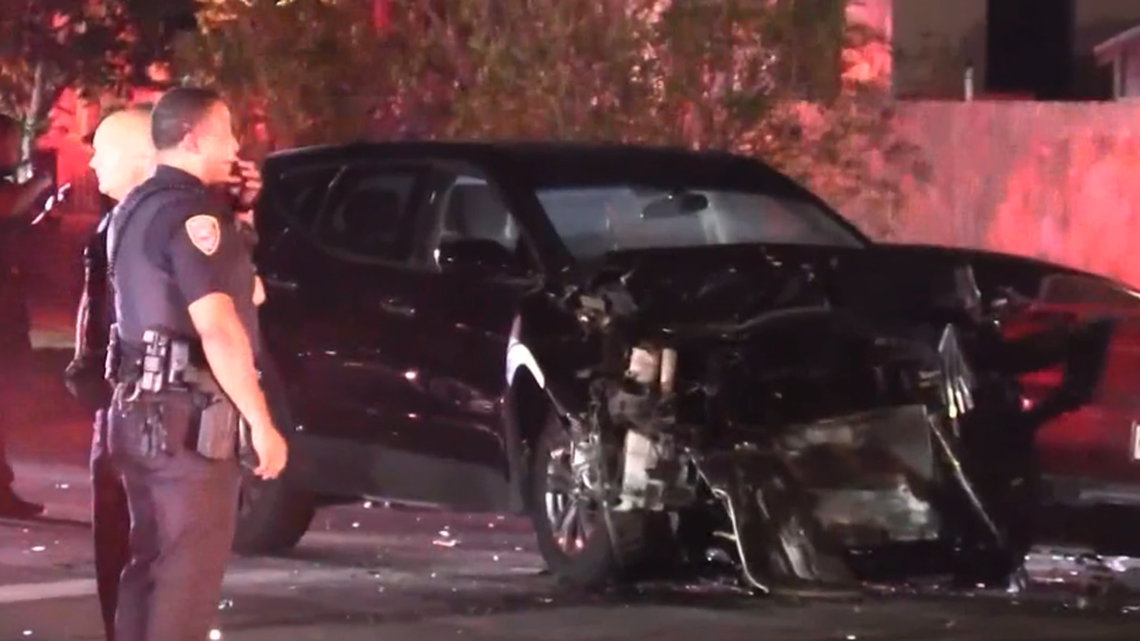 A bartender was arrested after authorities say he overserved a man before a crash that killed four vacationers.