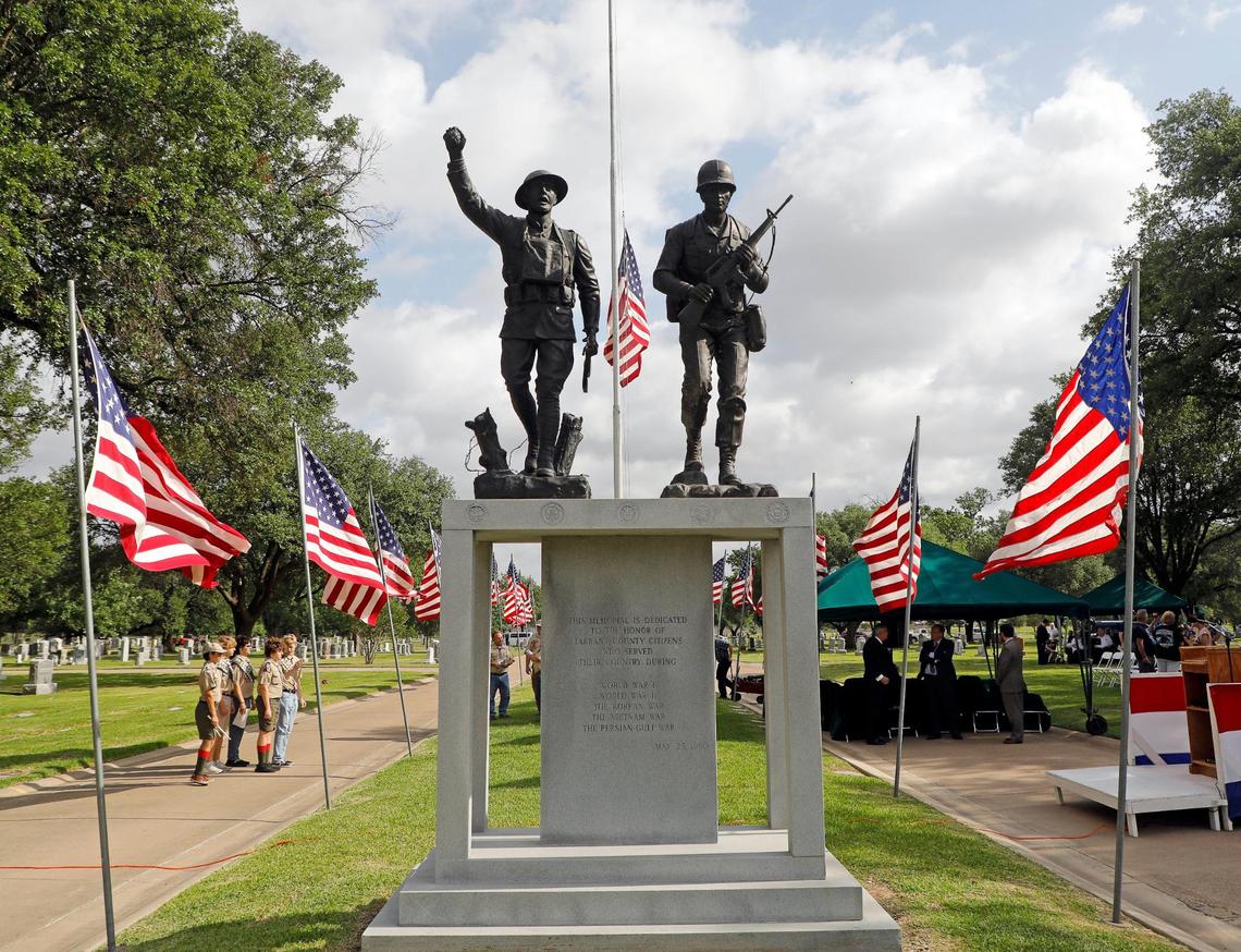 Five wars are listed on the memorial that honors Tarrant County citizens who served during The 93rd Fort Worth Memorial Day Service at Mount Olivet Cemetery in Fort Worth, Texas, Monday, May 30, 2022. (Special to the Star-Telegram Bob Booth)